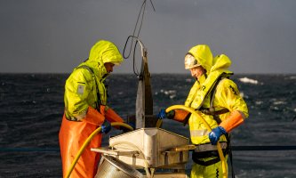 Two people at fieldwork offshore
