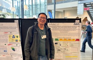 Li Xie with his poster