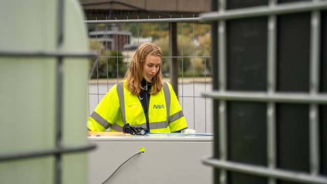 Woman in yellow NIVA suit 