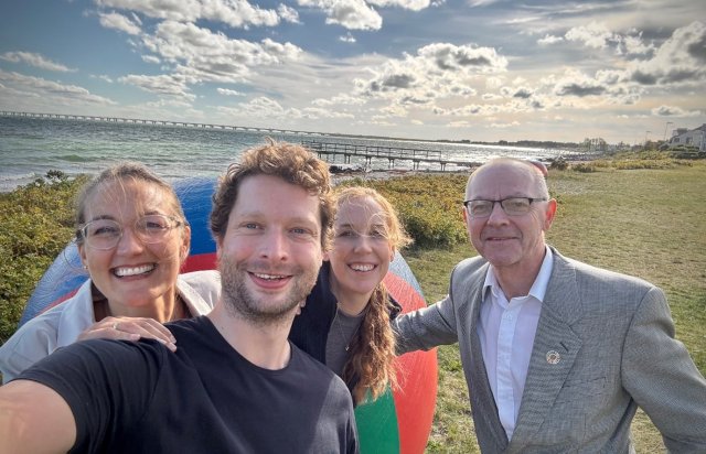 4 smilende voksne mennesker fra NIVA som ser i kamera. 